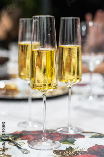 three glasses of toast with sparkling wine