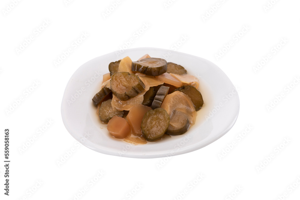A plate of Chinese style pickled vegetables isolated on white background A plate of Chinese style pickled vegetables isolated on white background