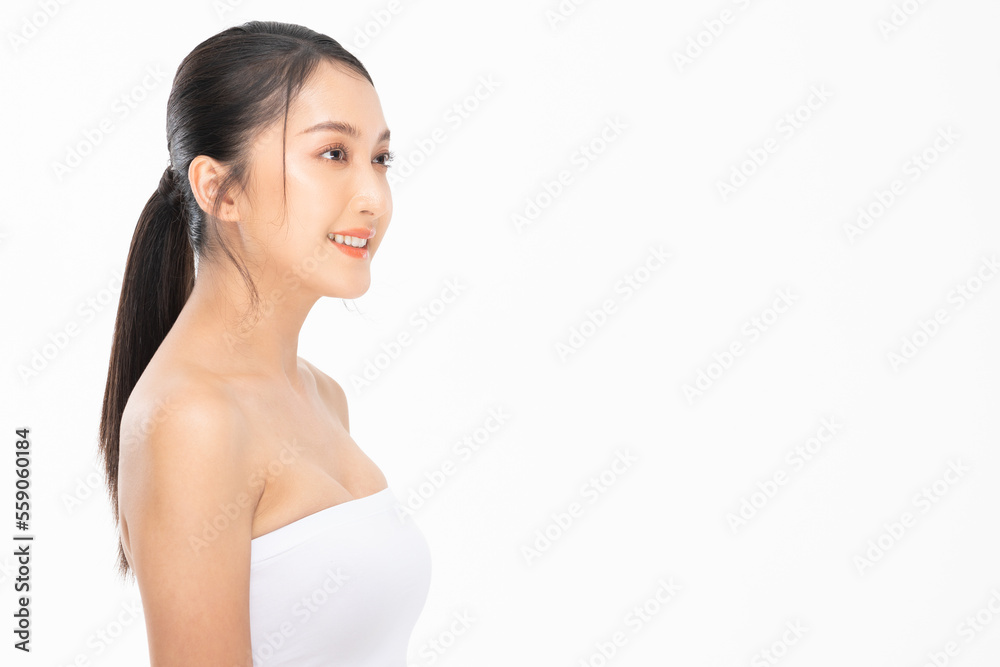 Side view of Beautiful Asian woman looking at camera smile with clean and fresh skin Happiness and cheerful with positive emotional,isolated on white background,Beauty and Cosmetics Concept Side view of Beautiful Asian woman looking at camera smile with clean and fresh skin Happiness and cheerful with positive emotional,isolated on white background,Beauty and Cosmetics Concept