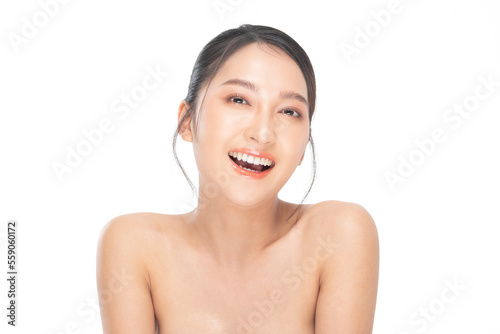 Beautiful Asian woman looking at camera smile with clean and fresh skin Happiness and cheerful with positive emotional,isolated on white background. Beauty and Cosmetics Concept. Proud her self.
