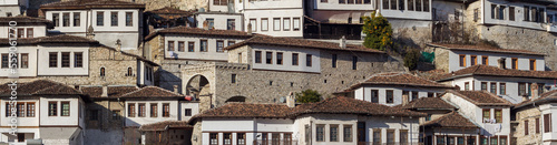Traditional houses In Berat, Albania, Europe. Cityscape with those famous aligned white facades. Blue sky