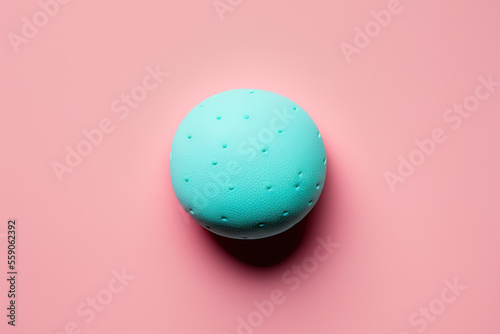 Top view of a blue ball on a pink backdrop. simple sports concept. Generative AI