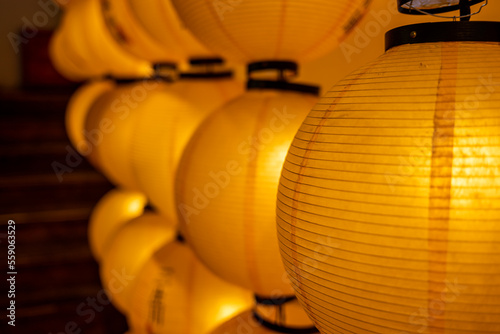 Yellow Chinese lanterns hanging in a row in jinli ancient street, Chengdu, Sichuan province, China