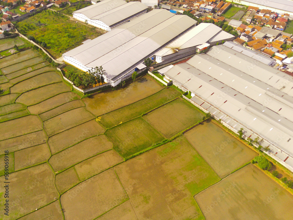 Factory area around farmland in Cikancung area - Indonesia. Not Focus Factory area around farmland in Cikancung area - Indonesia. Not Focus