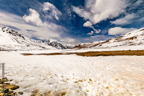 landscape with snow and clouds photo