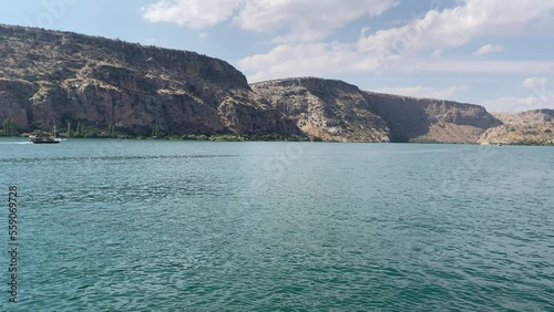 Hasankeyf, Batman, TURKEY, 08 October 2022, Boat trips along the Tigris River in Hasankeyf. (tourist trip by boat) photo