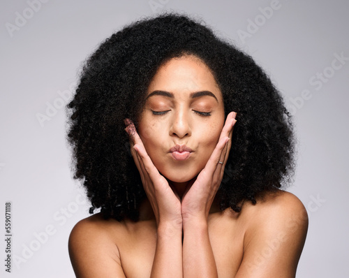 Photography Face kiss, beauty skincare and black woman with eyes closed in studio isolated on a gray background