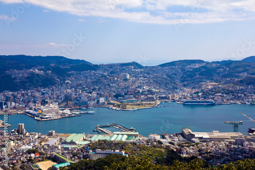 Nagasaki cityscapes skyline over the bay from above. 