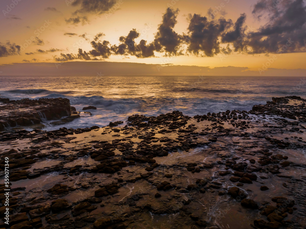 Dawn at the seaside and rock platform