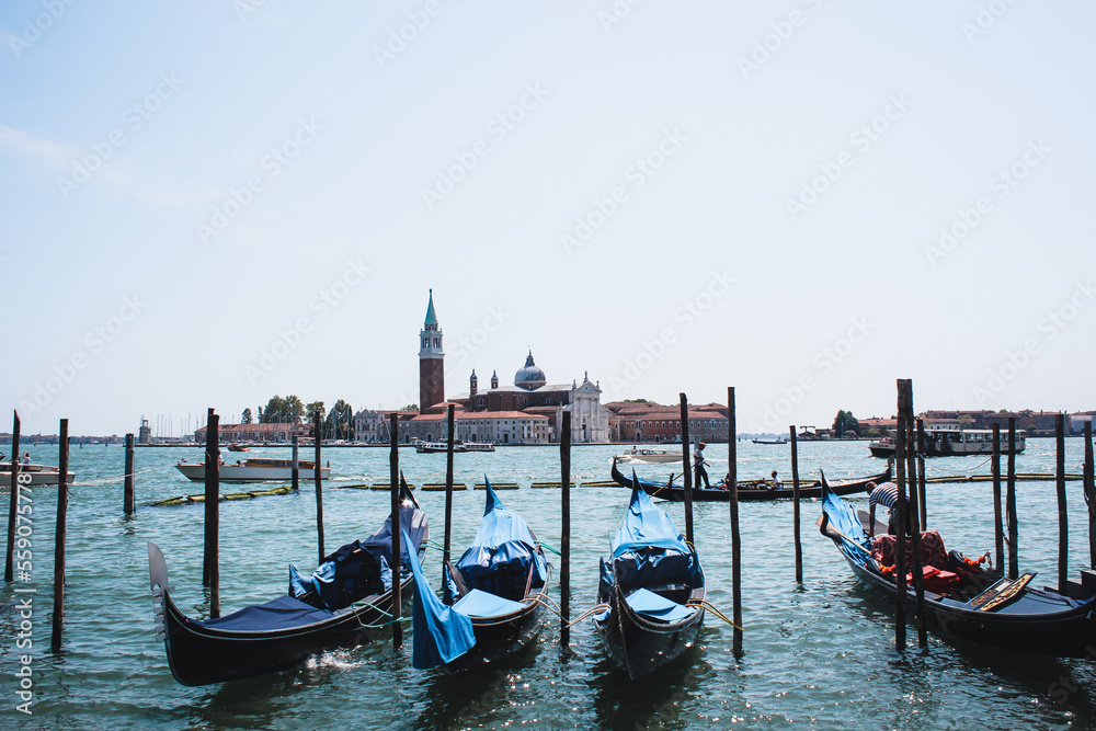 Venice, Italy: San Giorgio Maggiore church and gondolas at sunny day in Venice, Italy.