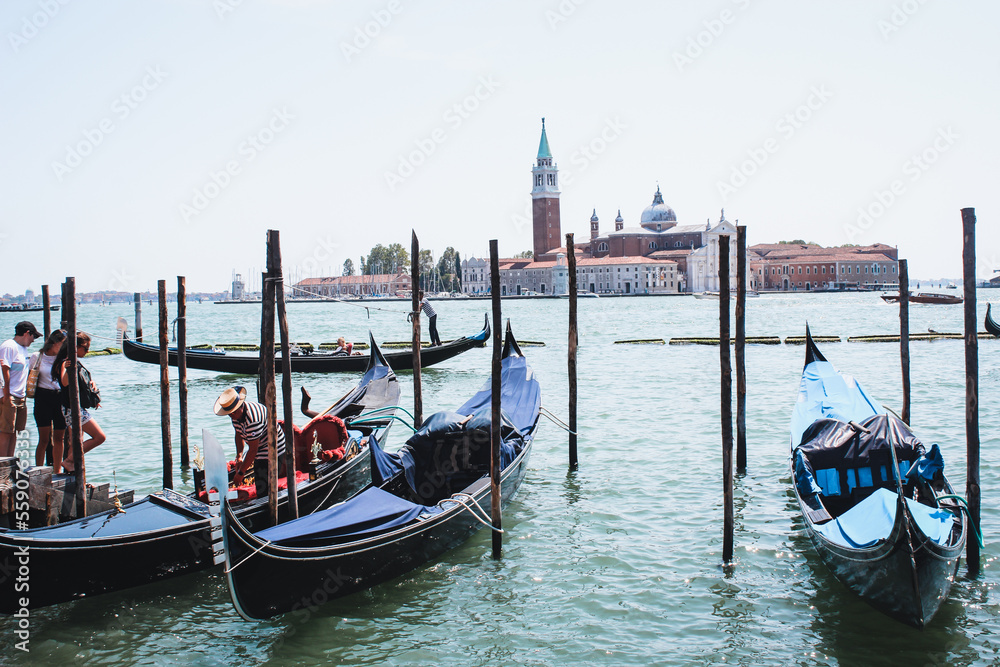 Venice, Italy: San Giorgio Maggiore church and gondolas at sunny day in Venice, Italy.