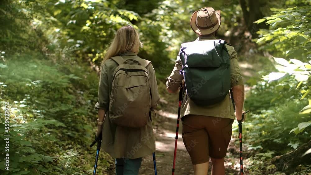 trekking in jungle forest. hiking on trail