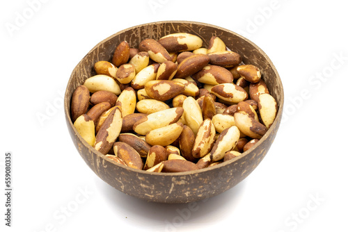 Brazil nut isolated on white background. Brazil nut in bowl. Studio shoot. close up