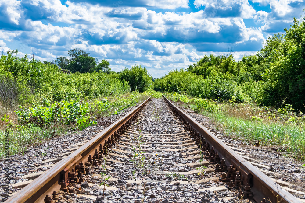 Photography to theme railway track after passing train on railroad Photography to theme railway track after passing train on railroad