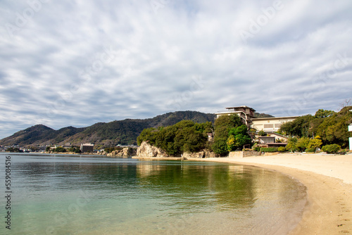 Fukuyama Japan 5th Dec 2022: The  view of Tanoura coast. It is a rare sandy beach on Sensuijima Island, a small island in the Seto Inland Sea.   photo