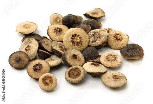 Dried bitter orange used in chinese herbal medicine isolated over white background. Zhi Ke, Fructus citri Aurantii. White background photo