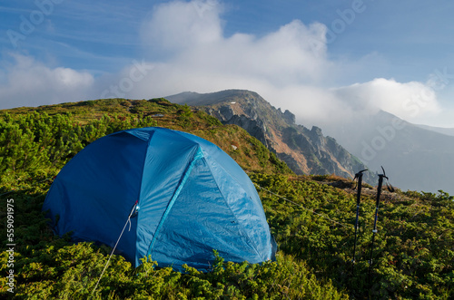 Hiking tent on the mountain top.