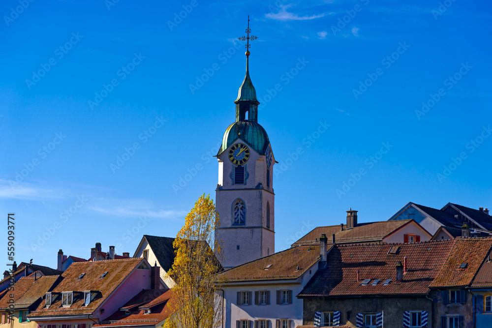 Scenic view of medieval old town of Swiss City of Olten, Canton Solothurn, with catholic church tower on a sunny autumn afternoon. Photo taken November 10th, 2022, Olten, Switzerland.