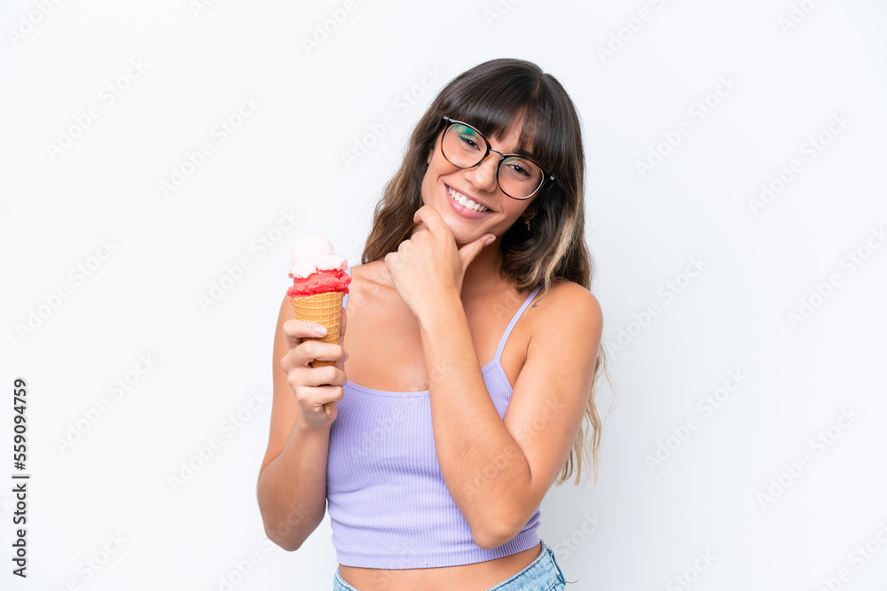 Young caucasian woman with a cornet ice cream over isolated white background happy and smiling Young caucasian woman with a cornet ice cream over isolated white background happy and smiling