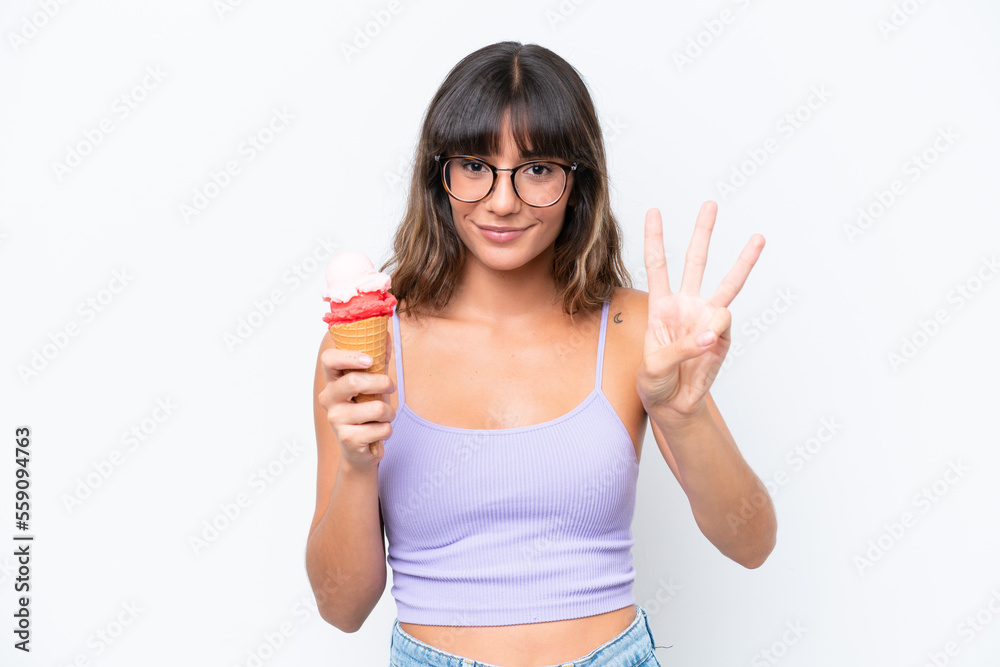 Young caucasian woman with a cornet ice cream over isolated white background happy and counting three with fingers Young caucasian woman with a cornet ice cream over isolated white background happy and counting three with fingers