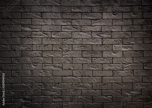 The wall is made of decorative, old, black crushed brick. Background. Space for text. Copy space