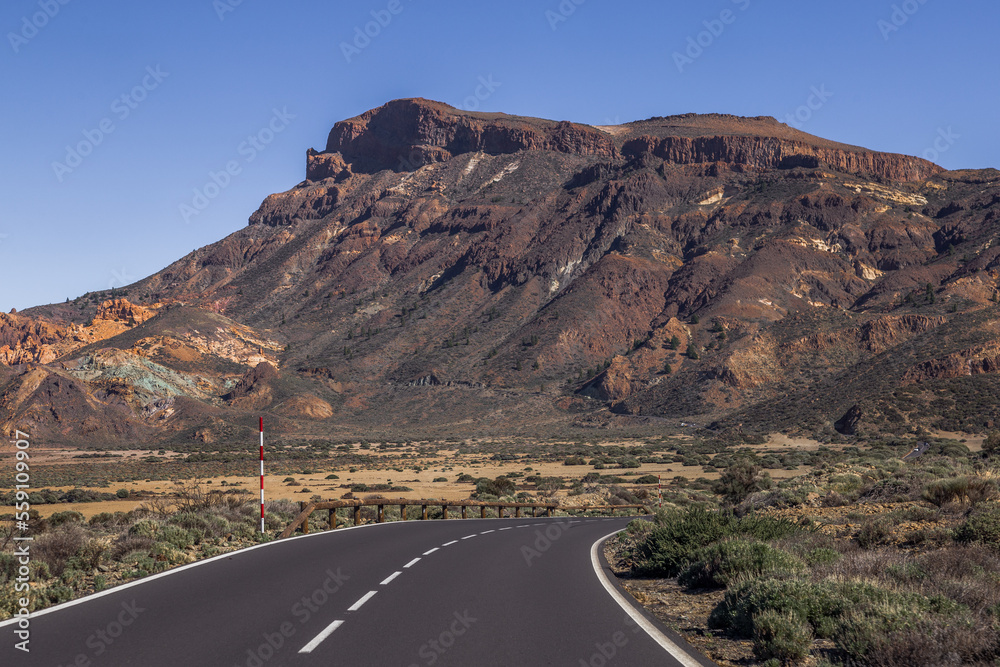 Roque de la Grieta in the background of the Empty Highway in Teide National Park