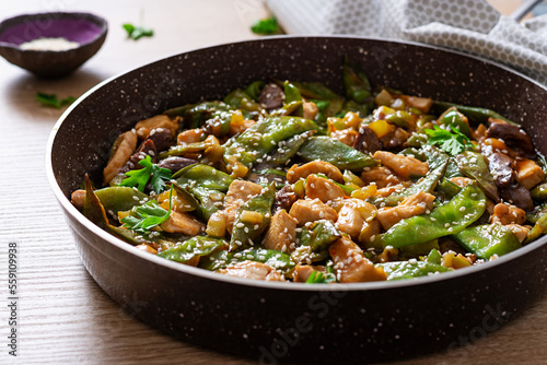 Stir fry chicken, green peas and green beans.. Asian style