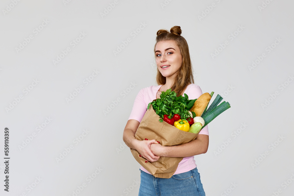 vegetarian woman hold paper bag with vegetables vegetarian woman hold paper bag with vegetables