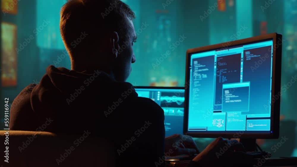 Computer Hacker in Hoodie. Obscured Dark Face. Hacker Attack, Virus Infected Software, Dark Web and Cyber Security concept