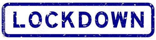 Grunge blue lockdown word square rubber seal stamp on white background