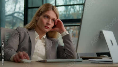 Tired lazy adult middle-aged woman female manager employee worker bored at work project online in computer in office Caucasian mature ill businesswoman need energy asleep feel overworked exhaustion