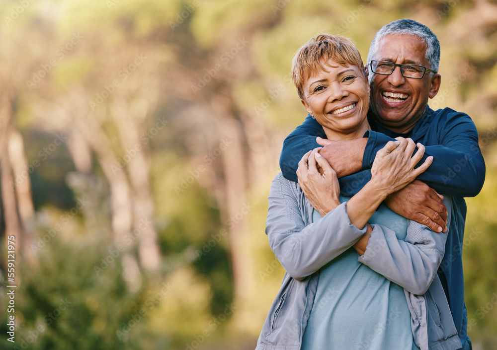 Fototapeta premium Nature, love and portrait of a senior couple hugging in a garden while on romantic outdoor date. Happy, smile and elderly people in retirement embracing in park while on a walk for fresh air together