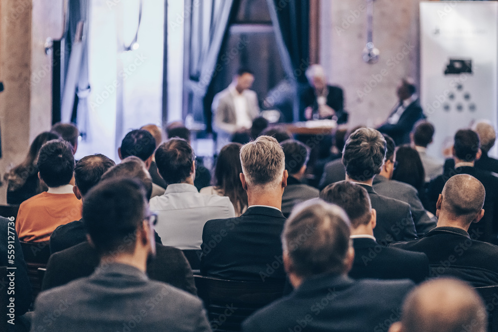 Obraz premium Round table discussion at business convention and Presentation. Audience at the conference hall. Business and entrepreneurship symposium.