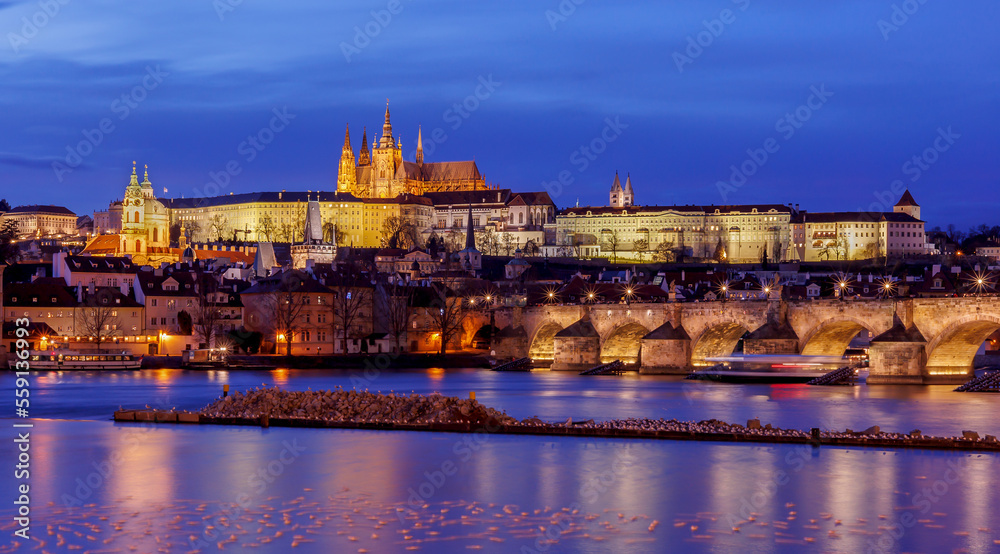 Panorama of Prague Castle,St. Vitus cathedral and Charles Bridge at sunset with dramatic sky. Prague, Czech Republic	
