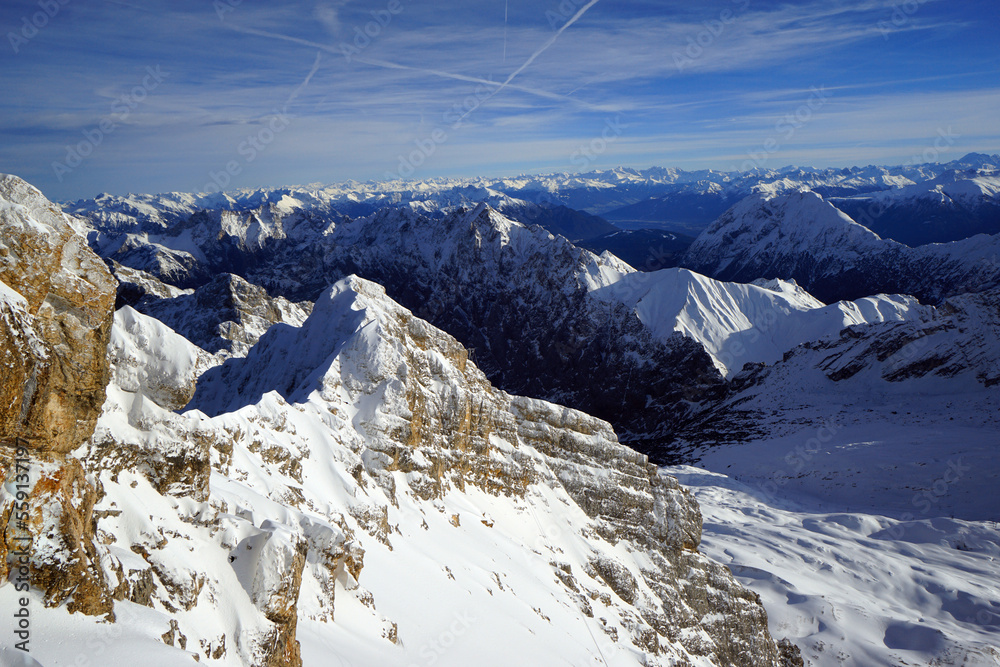 Beautiful nature view of Zugspitze peak in winter with snow capped mountains.
