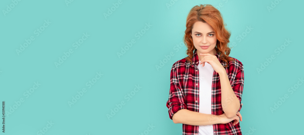 flirty redhead woman in checkered shirt on blue background. Woman isolated face portrait, banner with mock up copyspace. flirty redhead woman in checkered shirt on blue background. Woman isolated face portrait, banner with mock up copyspace.