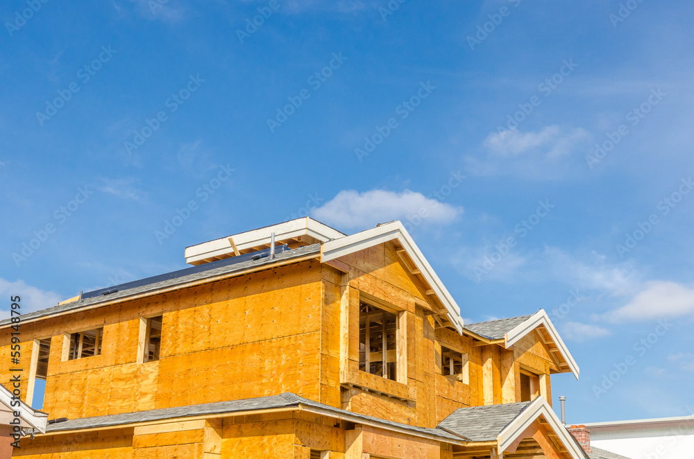 House under construction. The site with wooden frame. House under construction. The site with wooden frame.