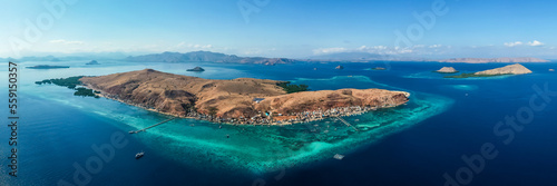 Aerial view of fishing village called Papagarang in Komodo National Part, East Nusa Tenggara, Flores, Indonesia.