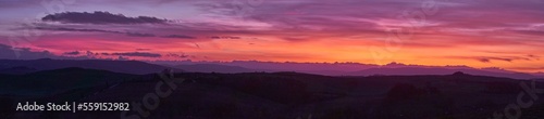 Panoramic view of a sunset in Val d'Orcia, Tuscany
