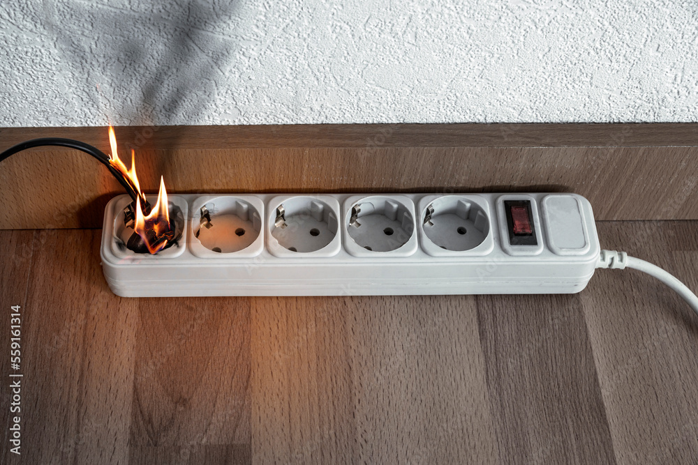 Short circuit Extension cord power cable with a plug, butning power