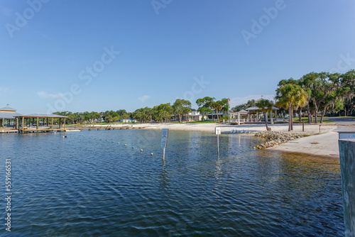 Drone view of a lake looking back the sandy shore