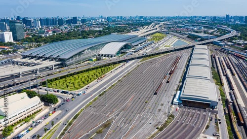 4K, Time Lapse of Modern Commuter train on elevated railway. Red line electric train at Bang Sue Grand Station in Bangkok, Thailand. Hyperlapse View