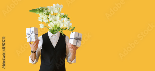 Handsome man with gifts on ...