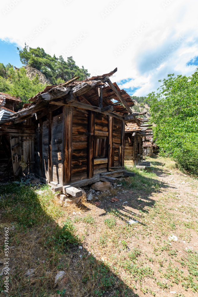 Obraz premium Grain warehouses Sinan Degirmeni in Doyran Village. It's estimated that the ancient Lycian region was inspired by the sarcophagi. There are 86 cereal warehouses in the region that can survive. Antalya