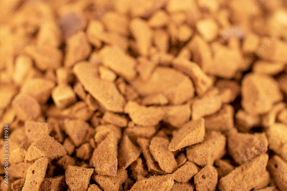 Fragrant instant coffee on slate stone, macro. Fragrant instant coffee on slate stone, macro.