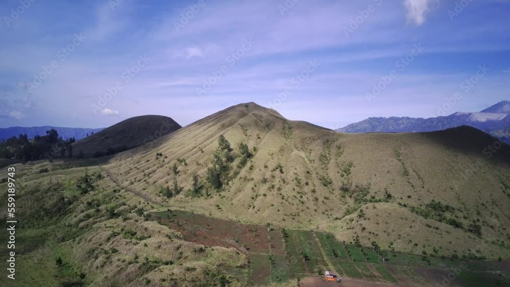 Aerial view of Kawah Wurung grass lands in Bondowoso, East Java. Indonesia. Drone footage. Aerial view of Kawah Wurung grass lands in Bondowoso, East Java. Indonesia. Drone footage.