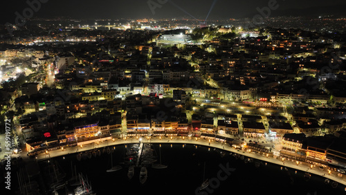 Aerial drone night shot of illuminated recently renovated round port of Mikrolimano in the heart of Piraeus, Attica, Greece © aerial-drone