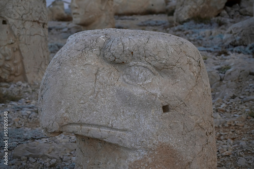 View of sculptures of mount nemrut, before sunrise monumental ruins with difused light and details photo