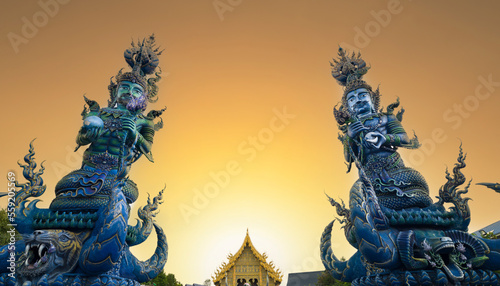 Wallpaper Mural Wat Rong Seur Ten or Blue temple at sunset. Modern Buddhist temple distinguished by its vivid blue and yellow coloring elaborate carvings. Northern Thailand Torontodigital.ca