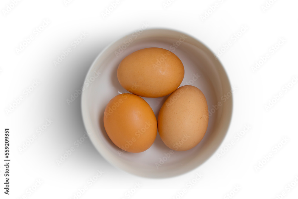 Whole eggs in a plate isolated on white background Whole eggs in a plate isolated on white background